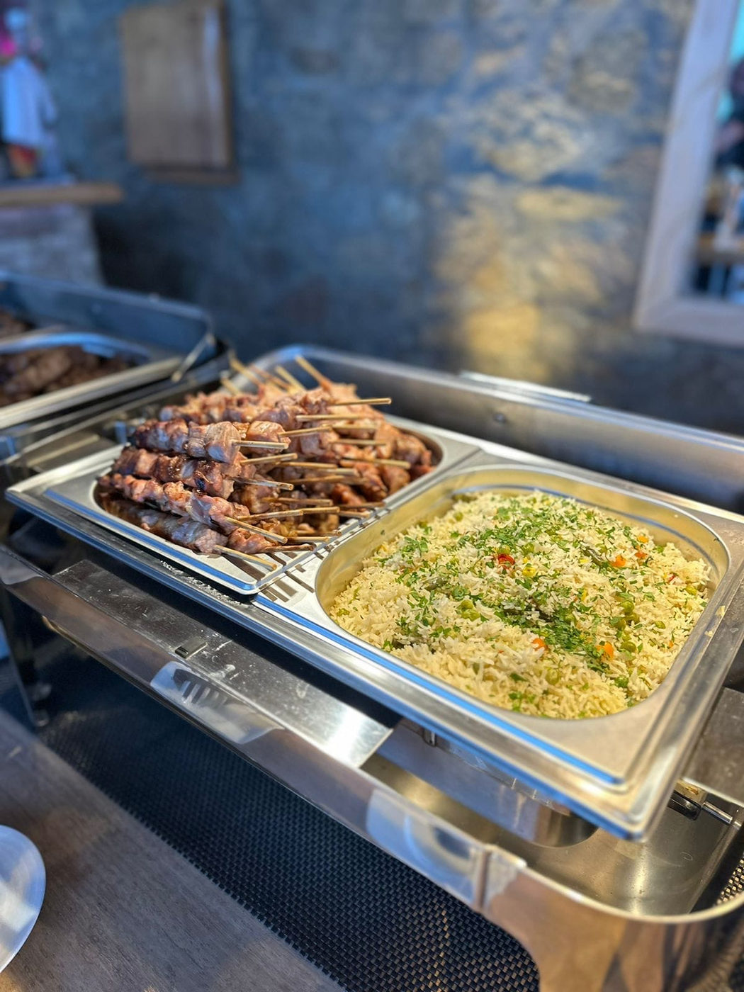 Grilled skewers and rice for a party buffet
